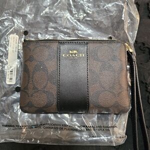 Brand new Coach wristlet
